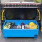 Large blue metal tool box chest with a range of electrical tools inside and a yellow hard hat. The toolbox is on the back of a pick up truck.